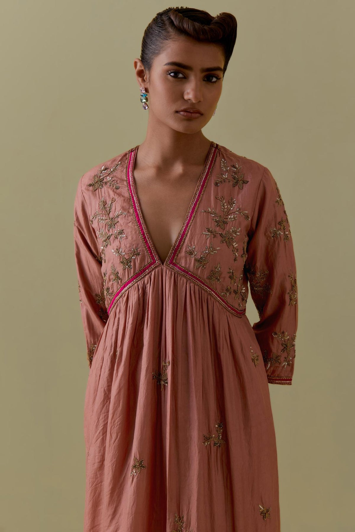 Peach silk Kurta set with hand worked Floral & Tree Motifs.