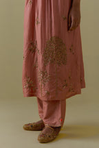 Peach silk Kurta set with hand worked Floral & Tree Motifs.