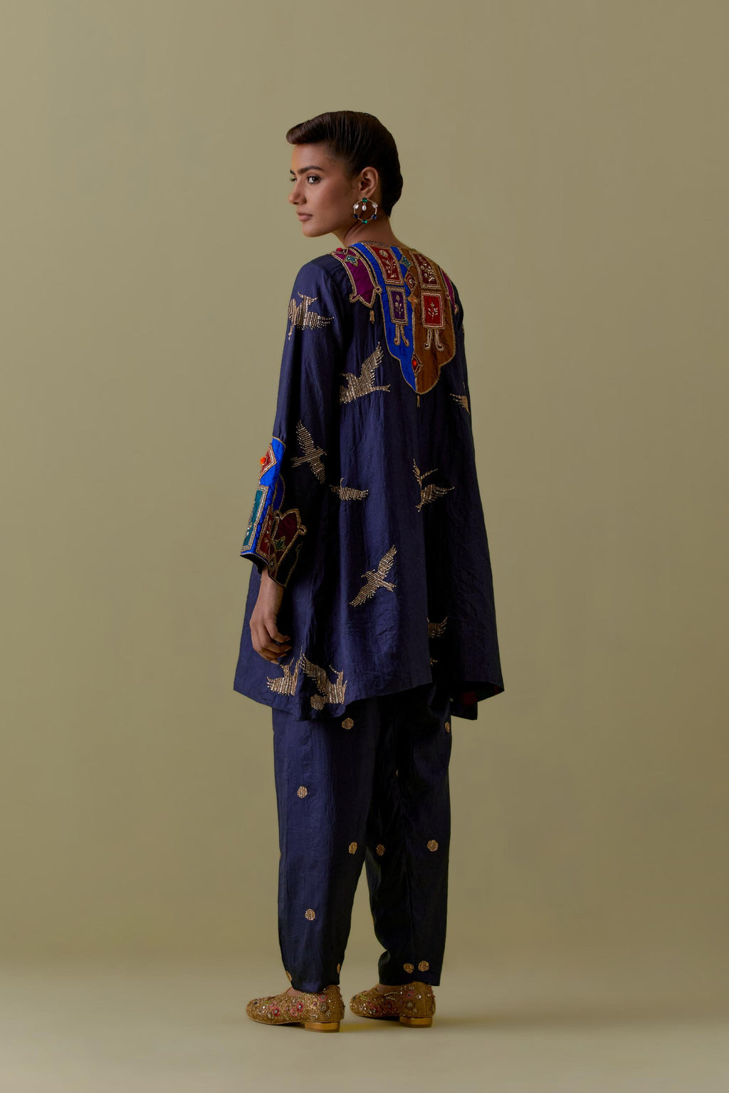 Indigo silk A-Line Kurta set with multicoloured appliqué & Hand-Worked Bird Motifs.