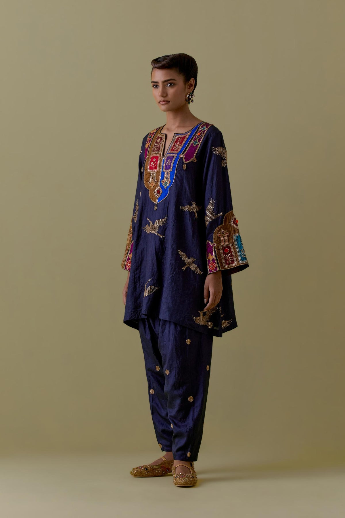 Indigo silk A-Line Kurta set with multicoloured appliqué & Hand-Worked Bird Motifs.