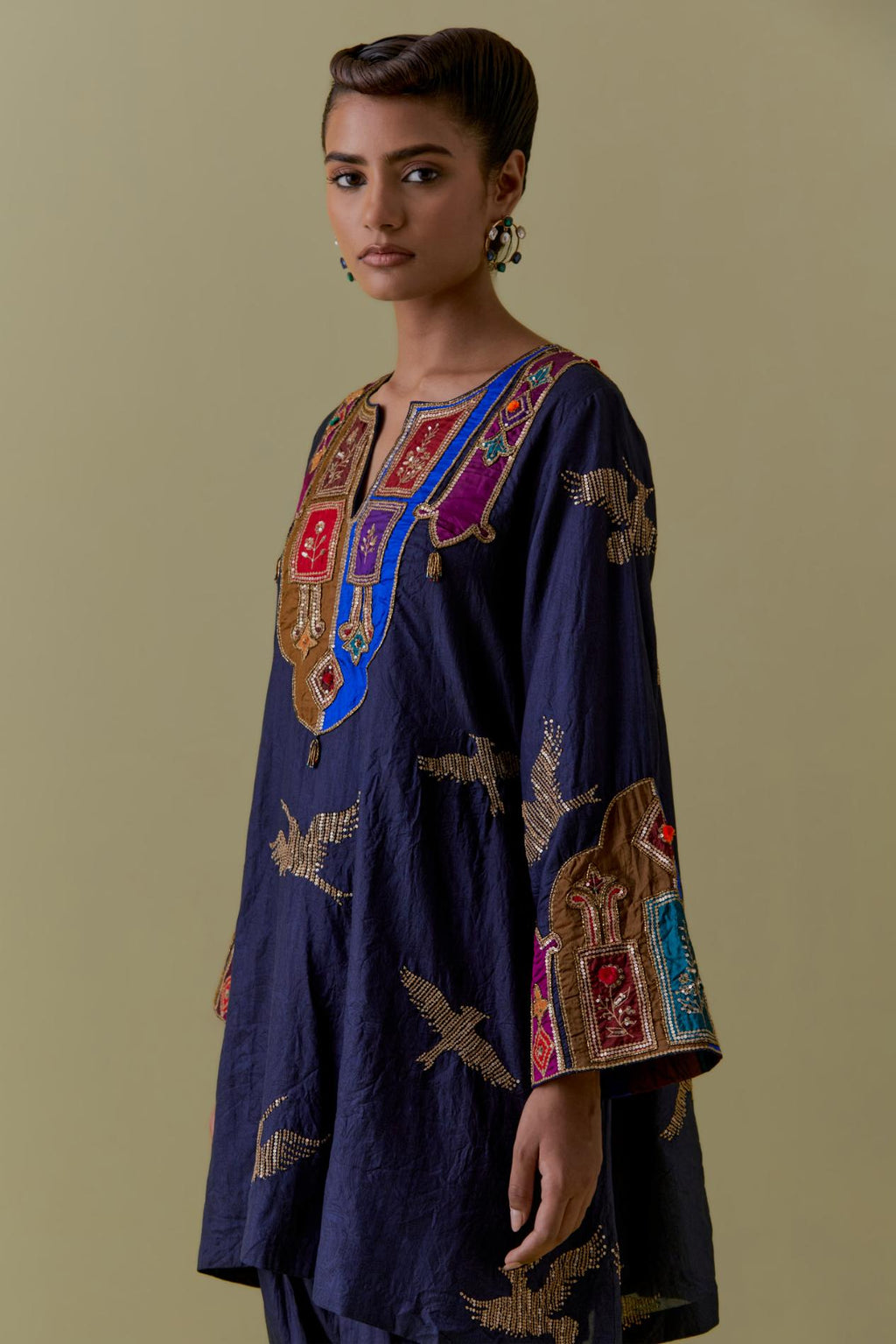 Indigo silk A-Line Kurta set with multicoloured appliqué & Hand-Worked Bird Motifs.