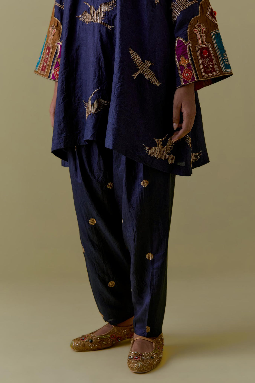 Indigo silk A-Line Kurta set with multicoloured appliqué & Hand-Worked Bird Motifs.