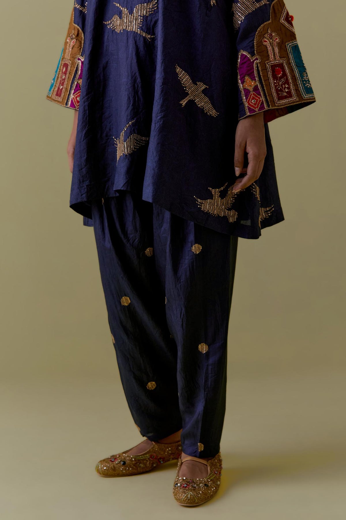 Indigo silk A-Line Kurta set with multicoloured appliqué & Hand-Worked Bird Motifs.