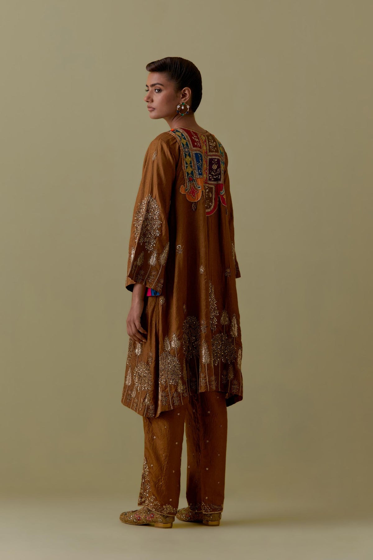 Olive A-Line silk short Kurta set with Multicoloured Appliqué & Gold Handwork.