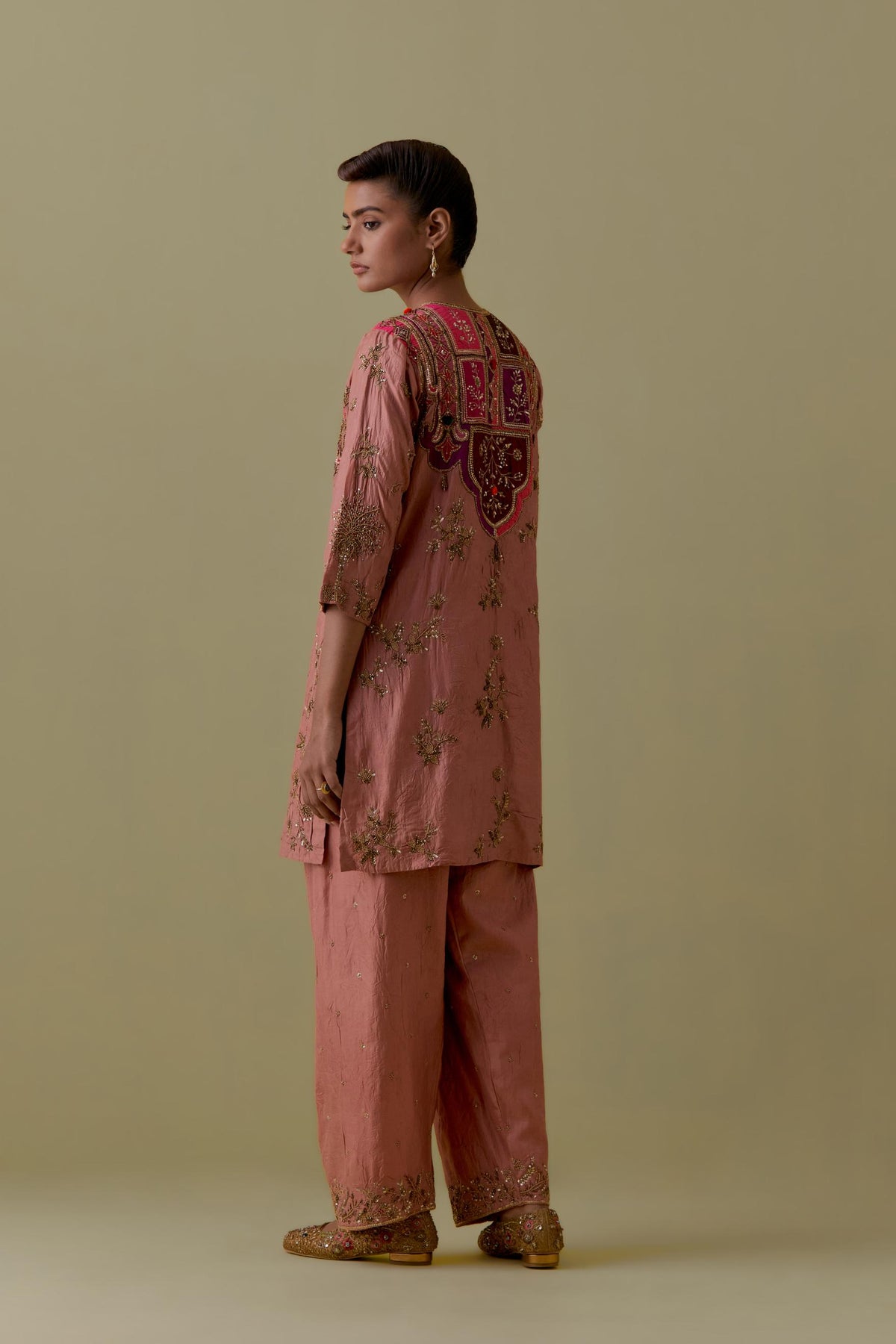 Peach Silk Short Kurta set with Multicoloured Appliqué & Handwork.