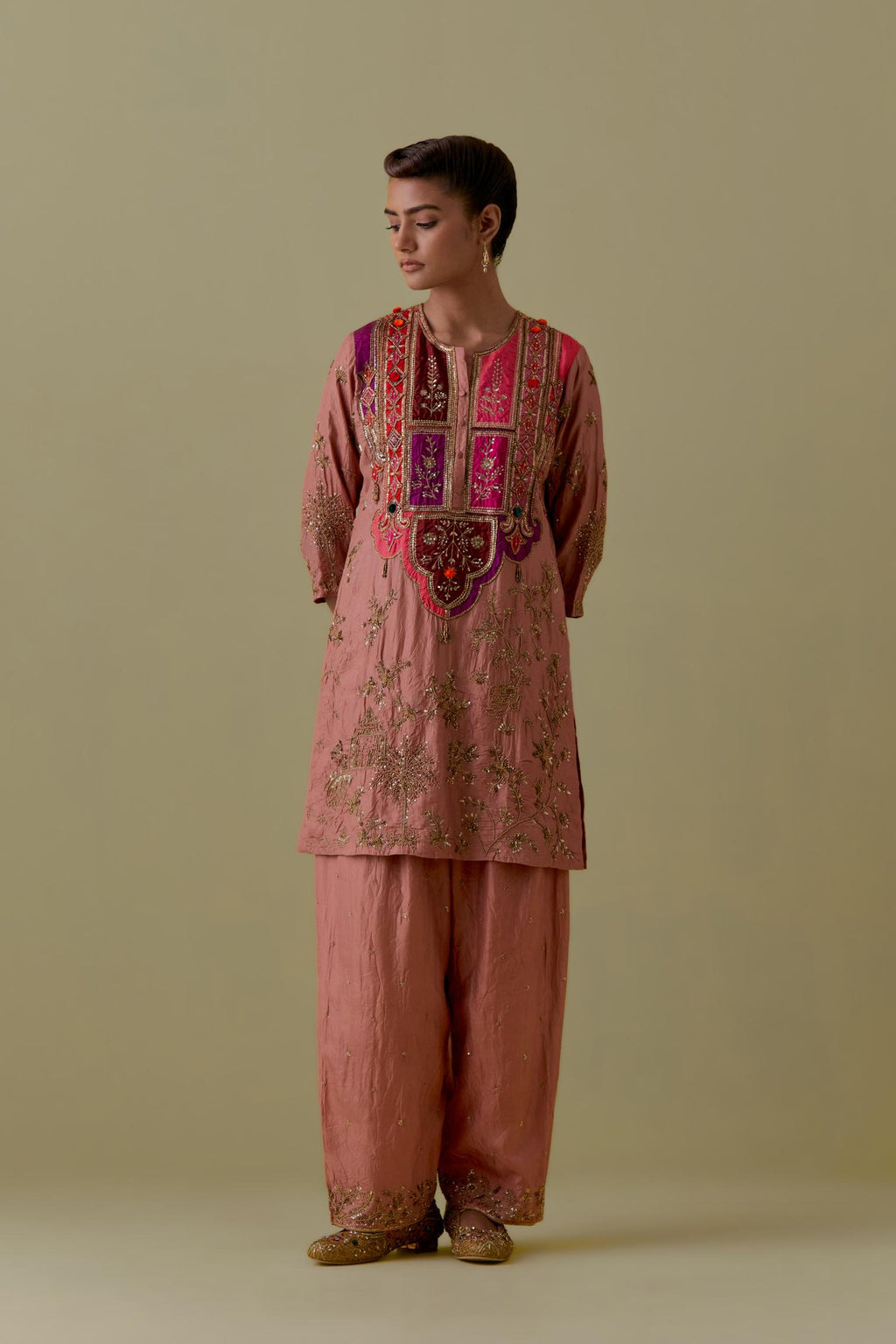 Peach Silk Short Kurta set with Multicoloured Appliqué & Handwork.