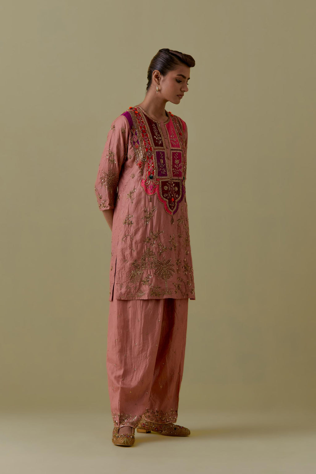 Peach Silk Short Kurta set with Multicoloured Appliqué & Handwork.