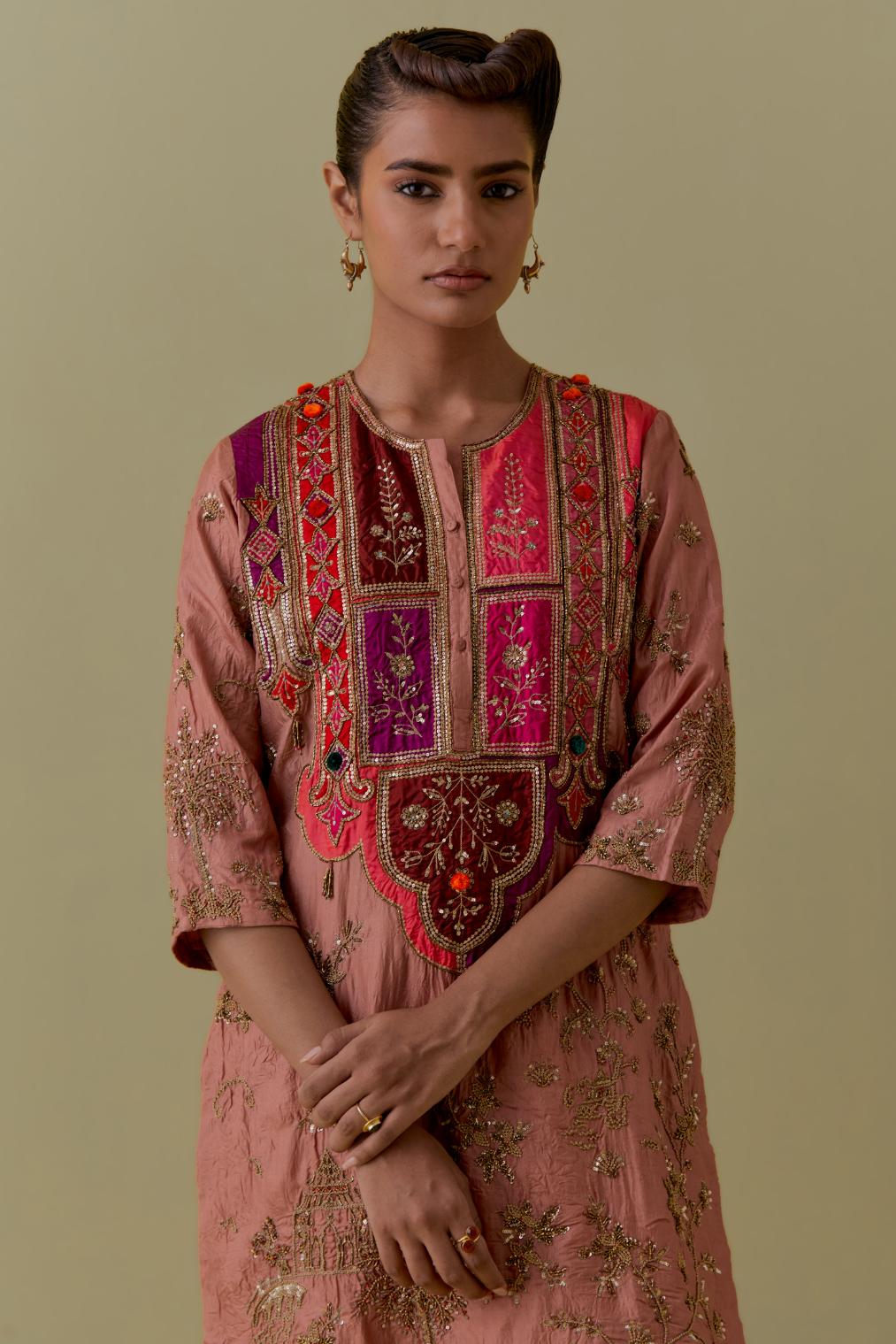 Peach Silk Short Kurta set with Multicoloured Appliqué & Handwork.
