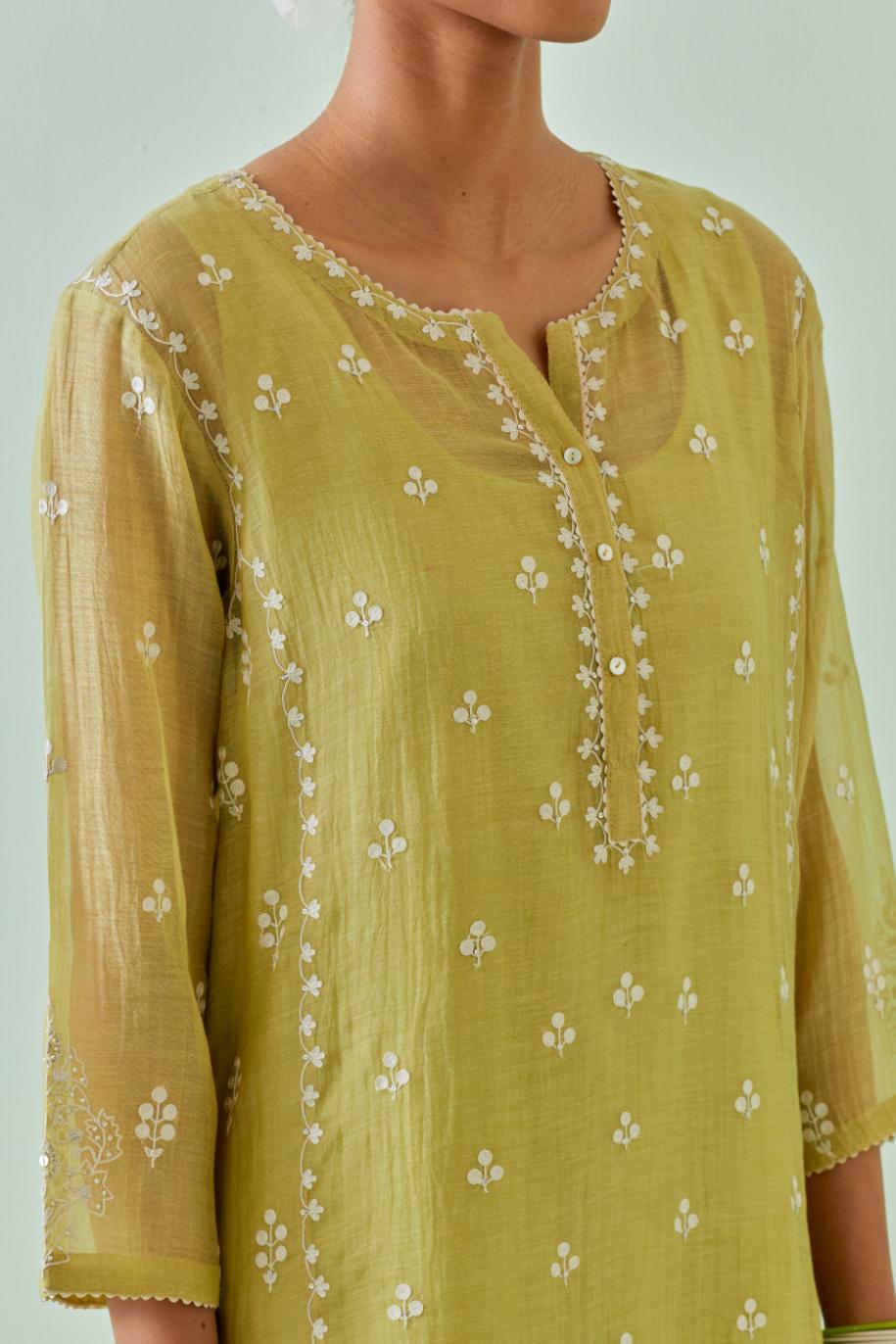 Green straight kurta set with all-over off white Dori embroidery, highlighted with delicate beaded work and embroidery detail at side panel joint seams.