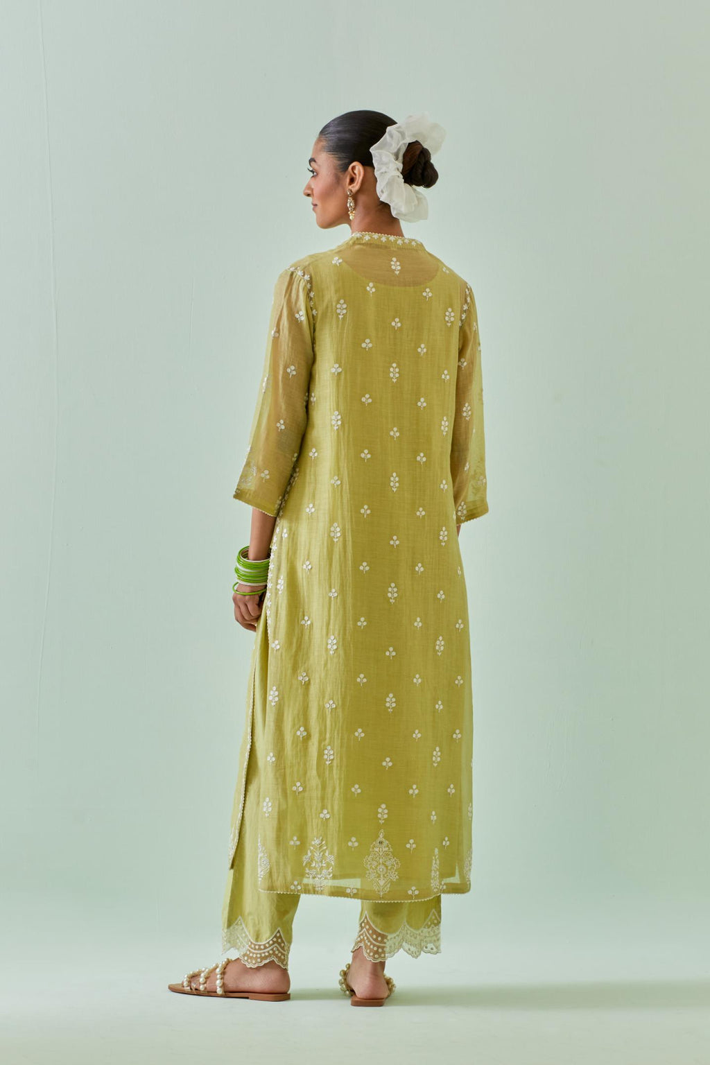 Green straight kurta set with all-over off white Dori embroidery and highlighted with delicate beaded hand work.