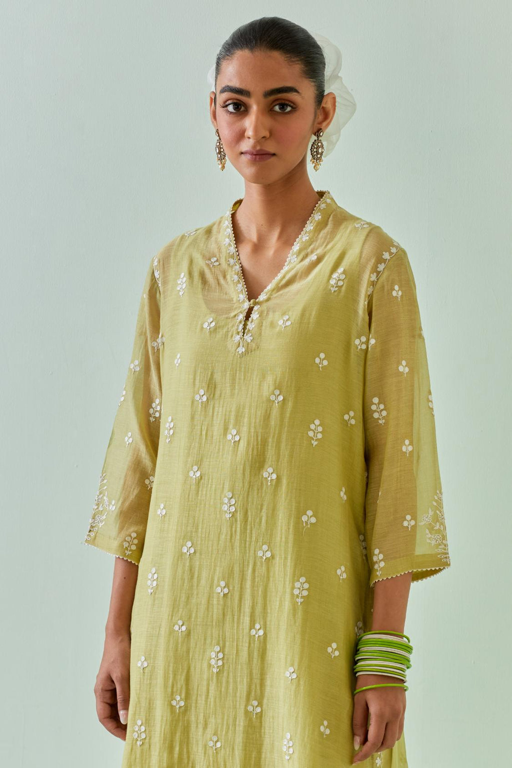 Green straight kurta set with all-over off white Dori embroidery and highlighted with delicate beaded hand work.