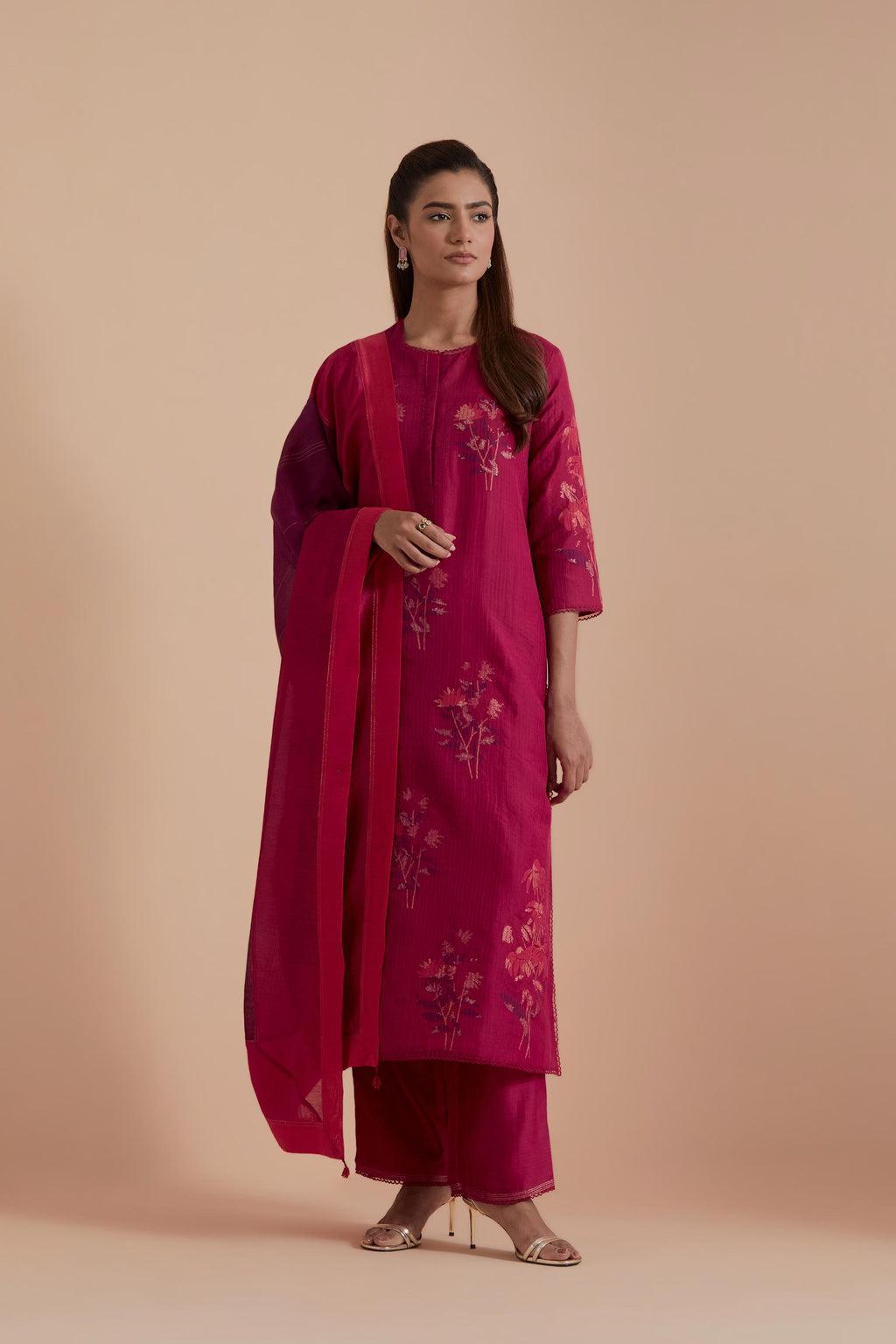 A silk chanderi three-tone dupatta in a beautiful gradient effect featuring delicate golden zari quilting all over.
