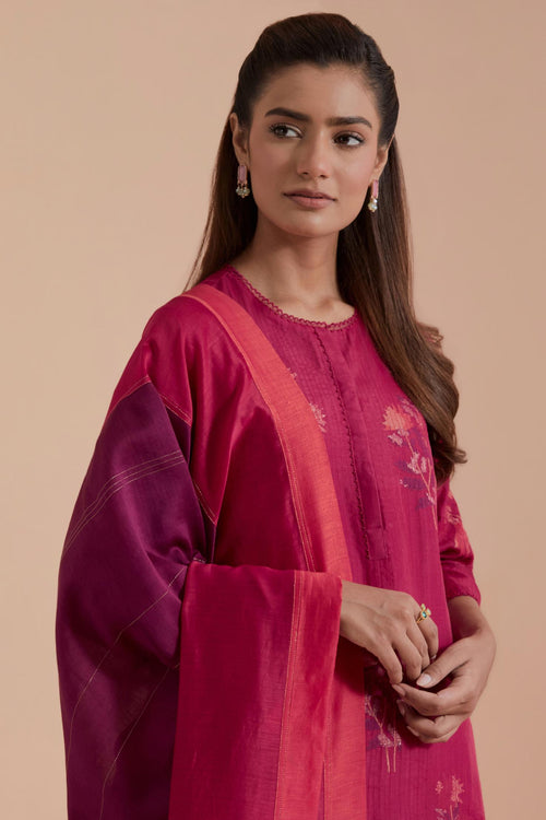 A silk chanderi three-tone dupatta in a beautiful gradient effect featuring delicate golden zari quilting all over.