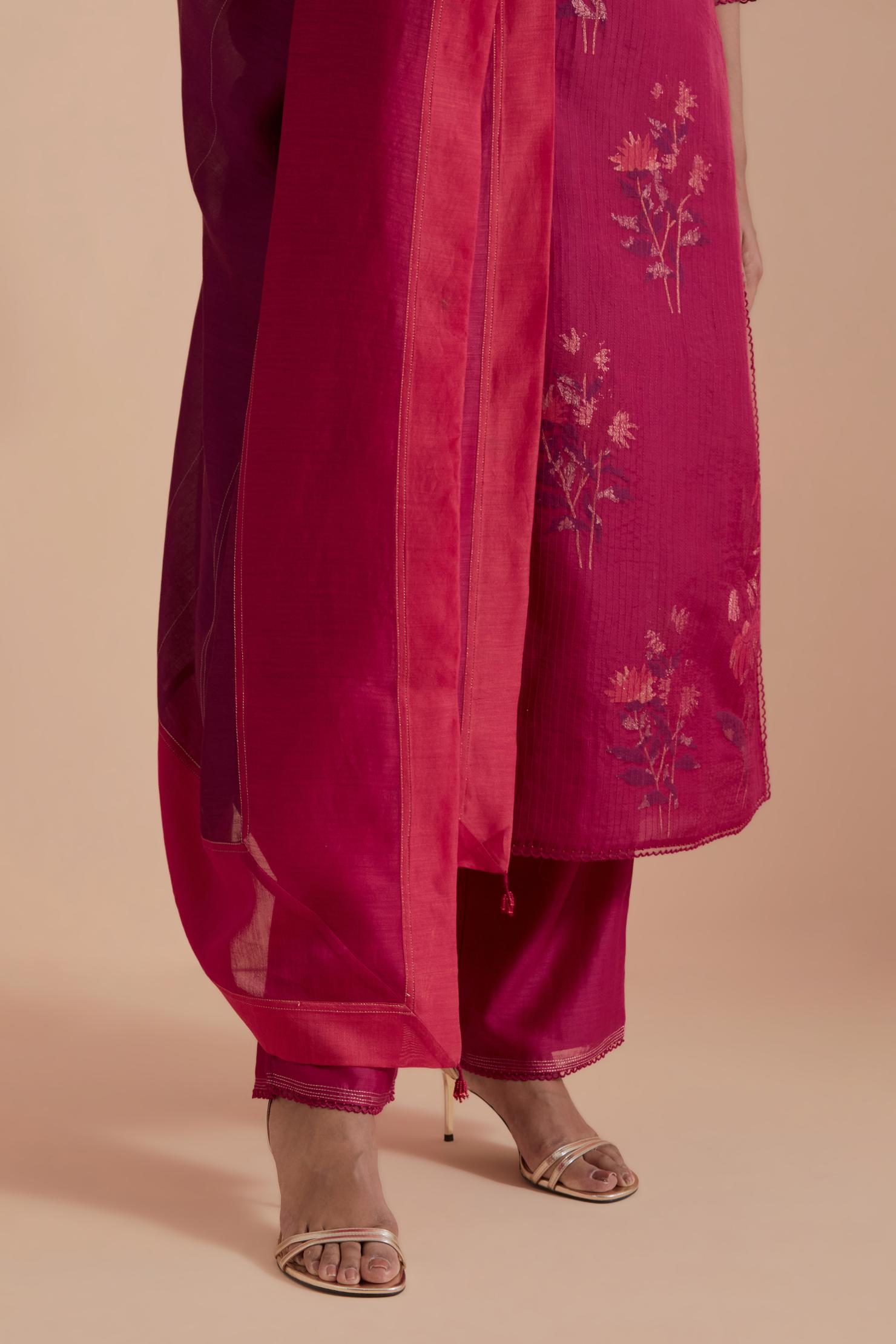 A silk chanderi three-tone dupatta in a beautiful gradient effect featuring delicate golden zari quilting all over.