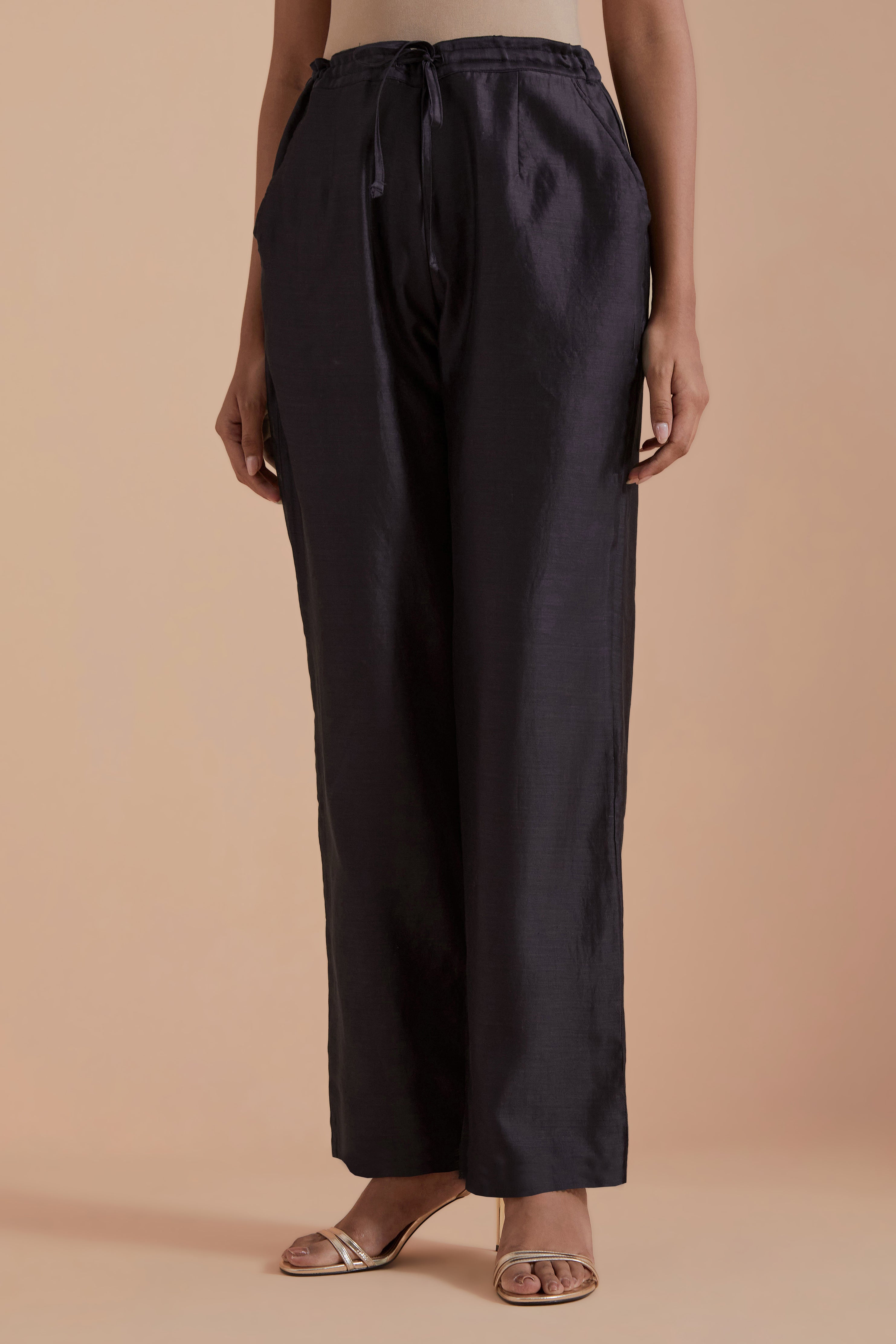 Dark grey silk chanderi straight pants.