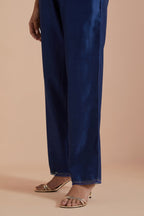 Blue silk chanderi straight pants detailed with scalloped organza edging at the hem, delicately highlighted with gold zari quilting.
