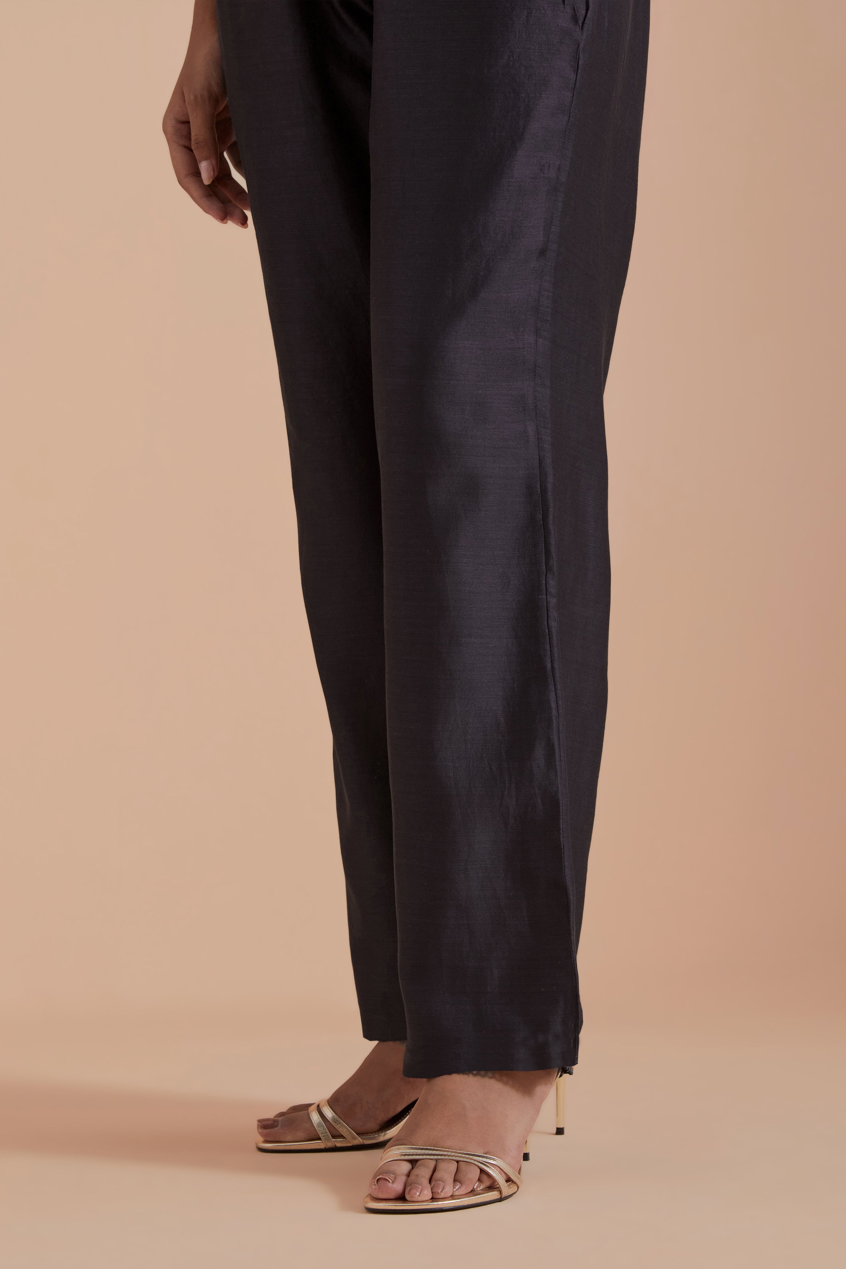 Dark grey silk chanderi straight pants.