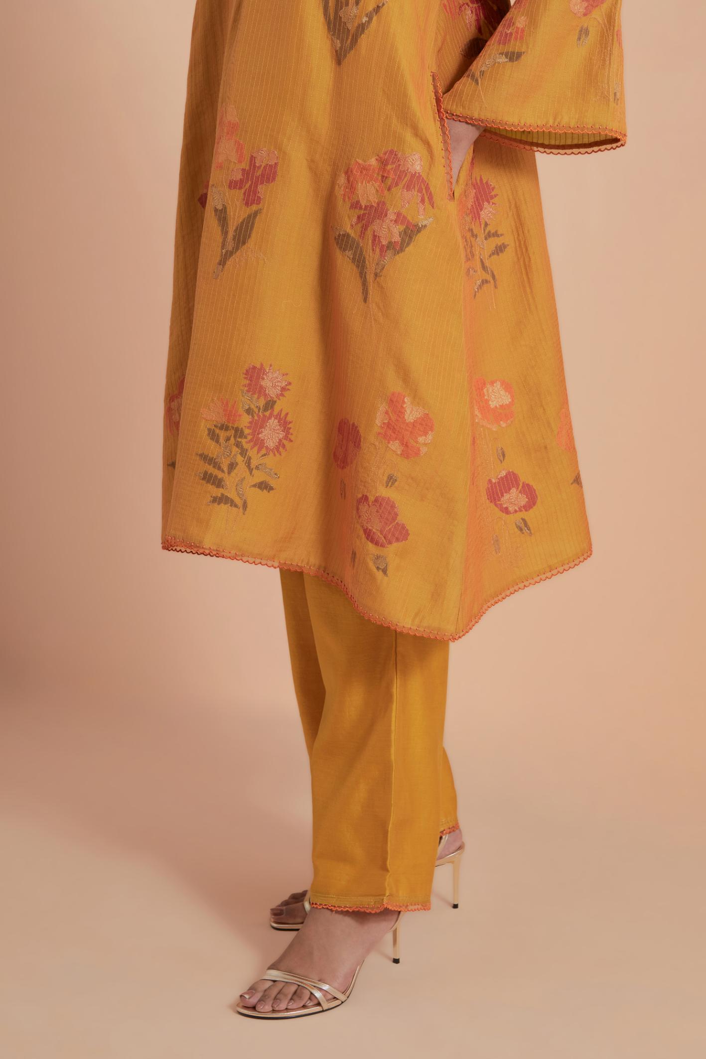 Mustard Silk Chanderi Quilted Organza & Brocade Floral Appliqué short A-line Kurta set.