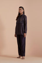 Dark grey Silk Chanderi Shirt with Quilted Organza & Brocade Floral Appliqué Yoke. Paired with dark grey silk chanderi straight pants.