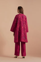 Fuchsia short front open A-line jacket set layered with quilted Silk Organza and delicate Silk Brocade floral appliquéd bootas. Paired with fuchsia silk chanderi straight pants.