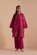 Fuchsia short front open A-line jacket set layered with quilted Silk Organza and delicate Silk Brocade floral appliquéd bootas. Paired with fuchsia silk chanderi straight pants.