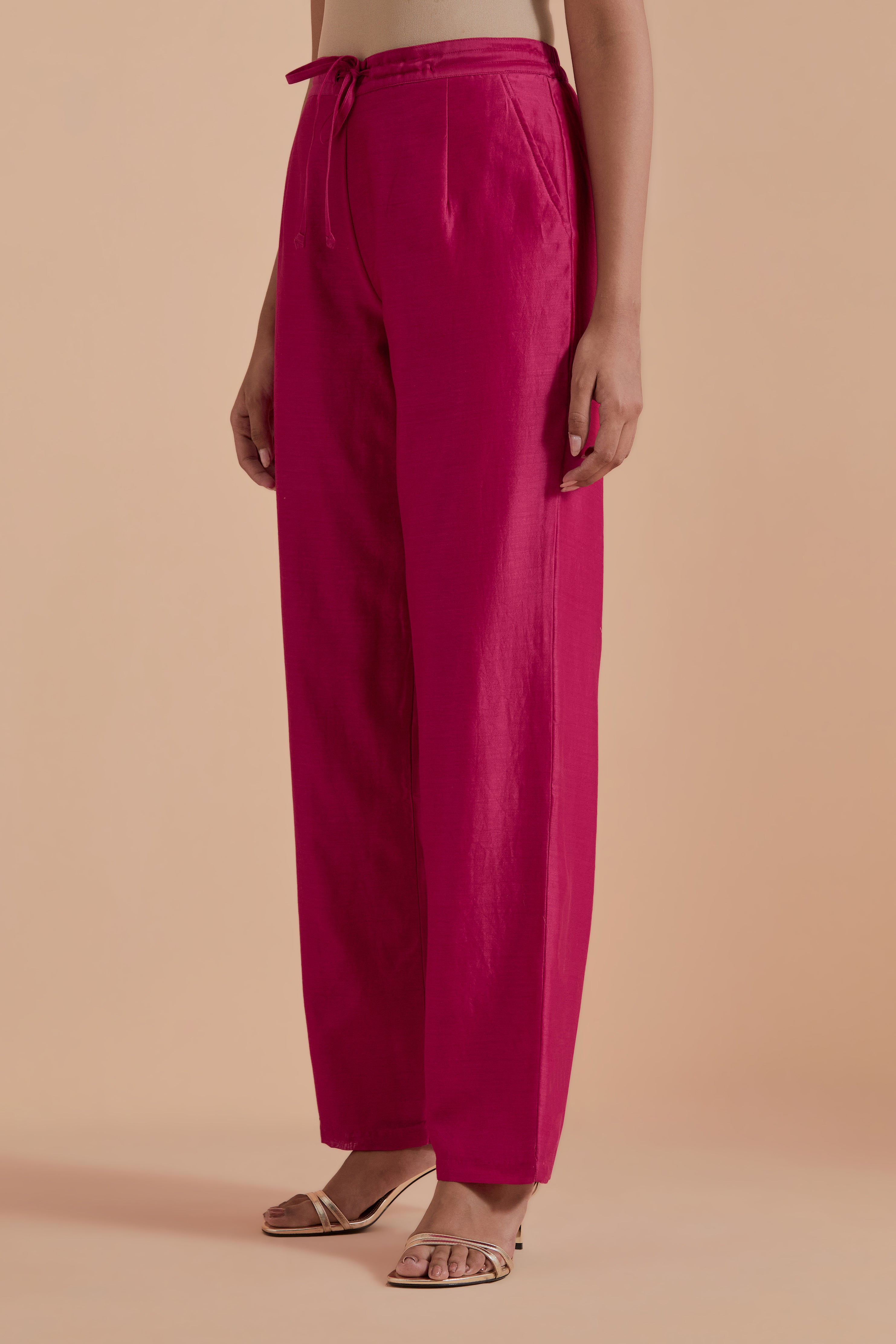 Dark pink silk chanderi straight pants.