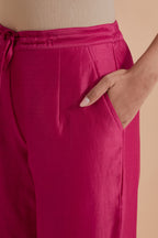 Dark pink silk chanderi straight pants.