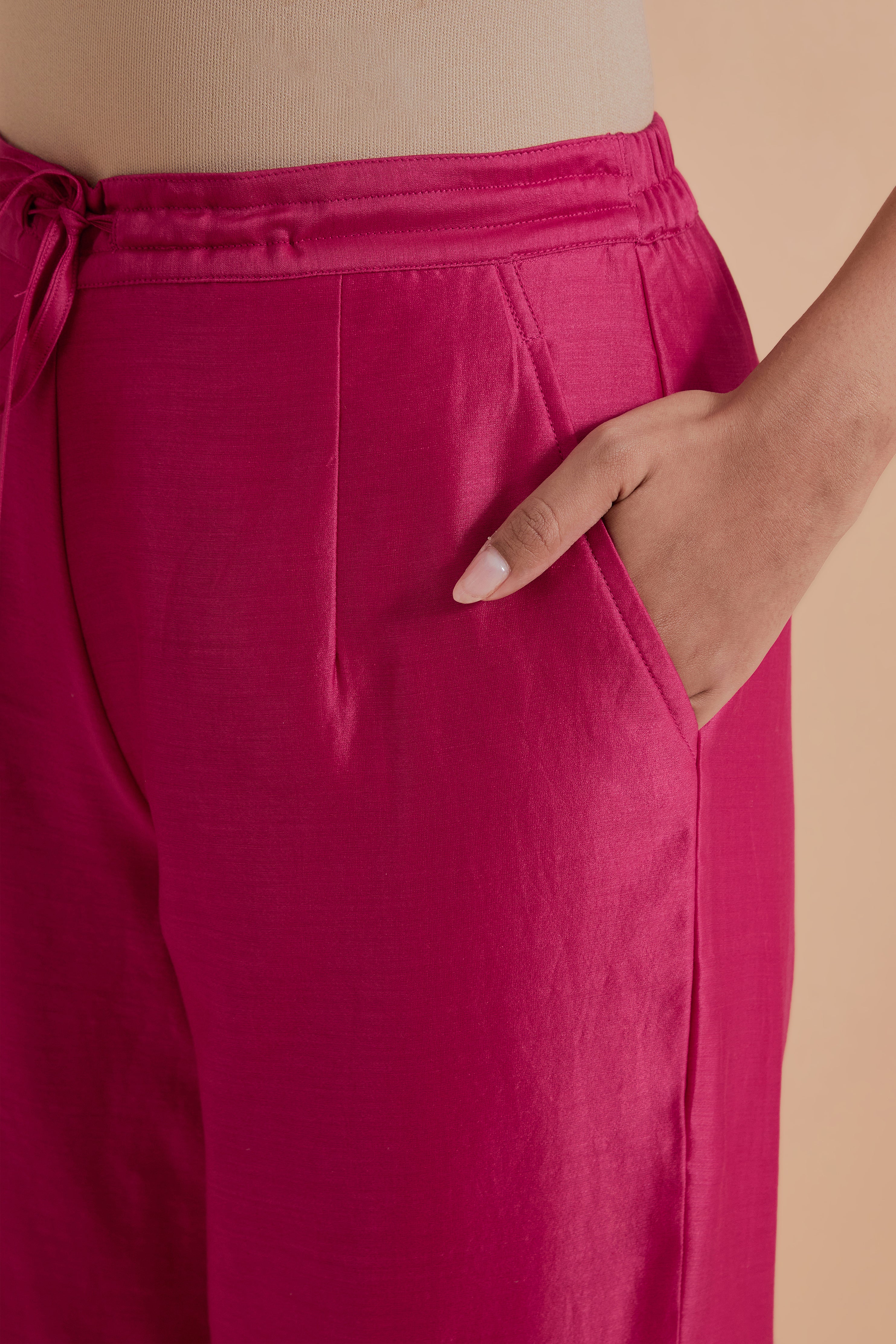 Dark pink silk chanderi straight pants.