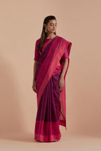 A silk Chanderi three-tone fuchsia saree in a beautiful gradient effect featuring delicate golden zari quilting all over. Paired with Fuchsia silk Chanderi Quilted Organza & Brocade Floral Appliqué blouse.