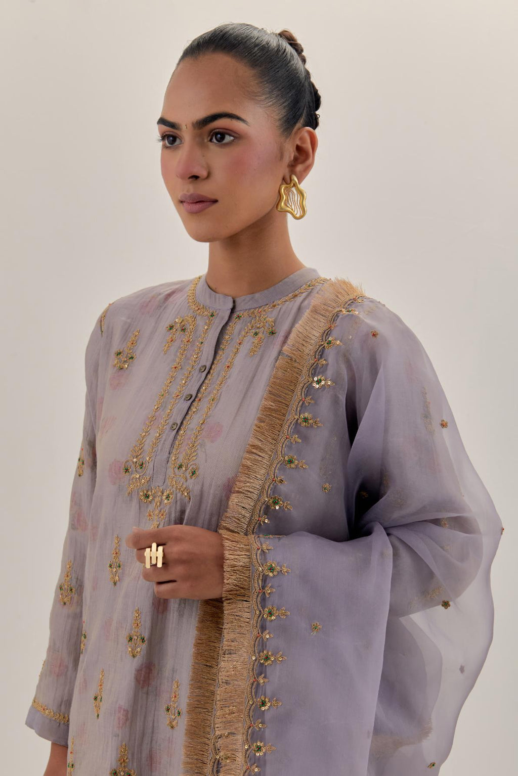 Lilac tissue chanderi straight short kurta set with all-over light gold dori embroidery.