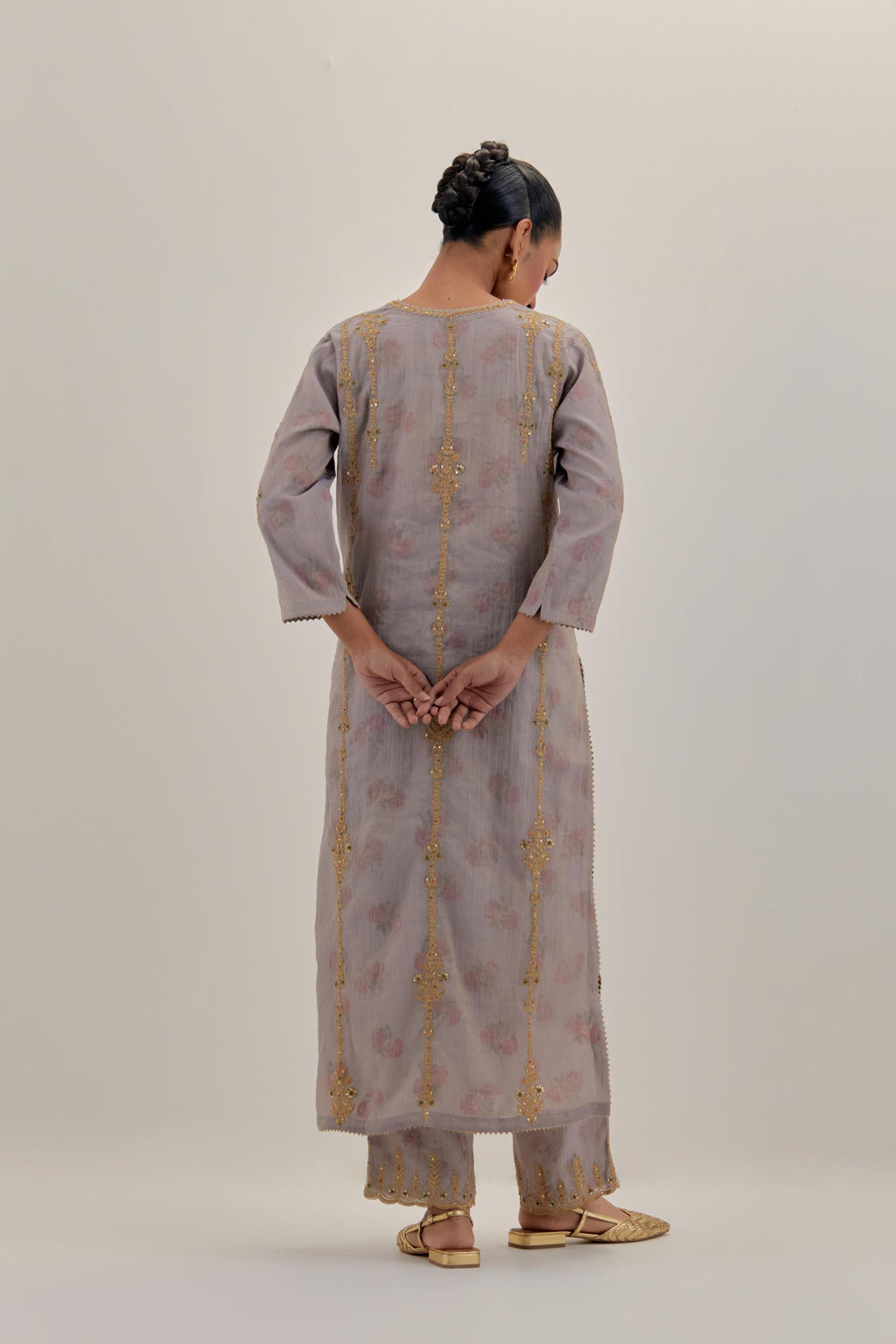 Lilac tissue chanderi straight kurta set with light gold dori embroidery, highlighted with multi color bead sequins work.