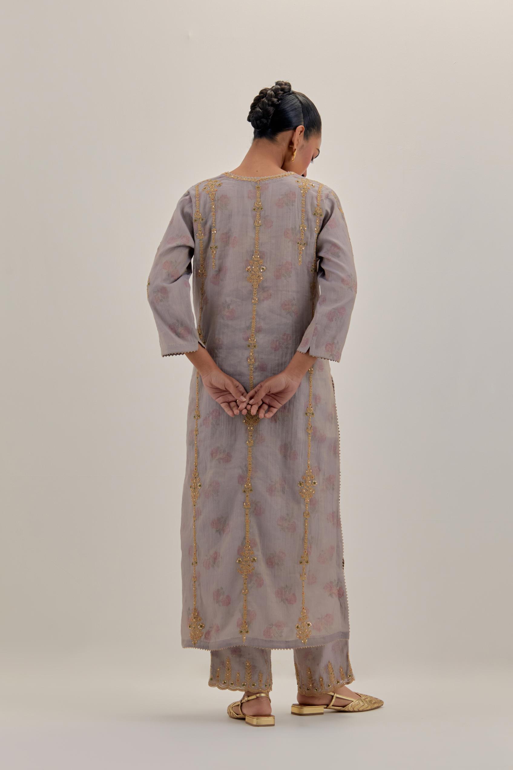 Lilac tissue chanderi straight kurta set with light gold dori embroidery, highlighted with multi color bead sequins work.