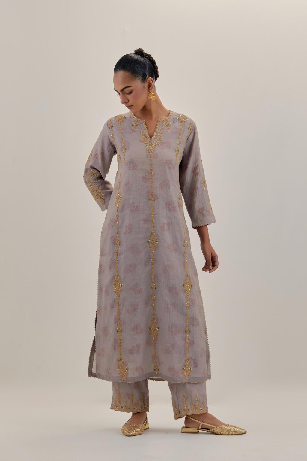 Lilac tissue chanderi straight kurta set with light gold dori embroidery, highlighted with multi color bead sequins work.