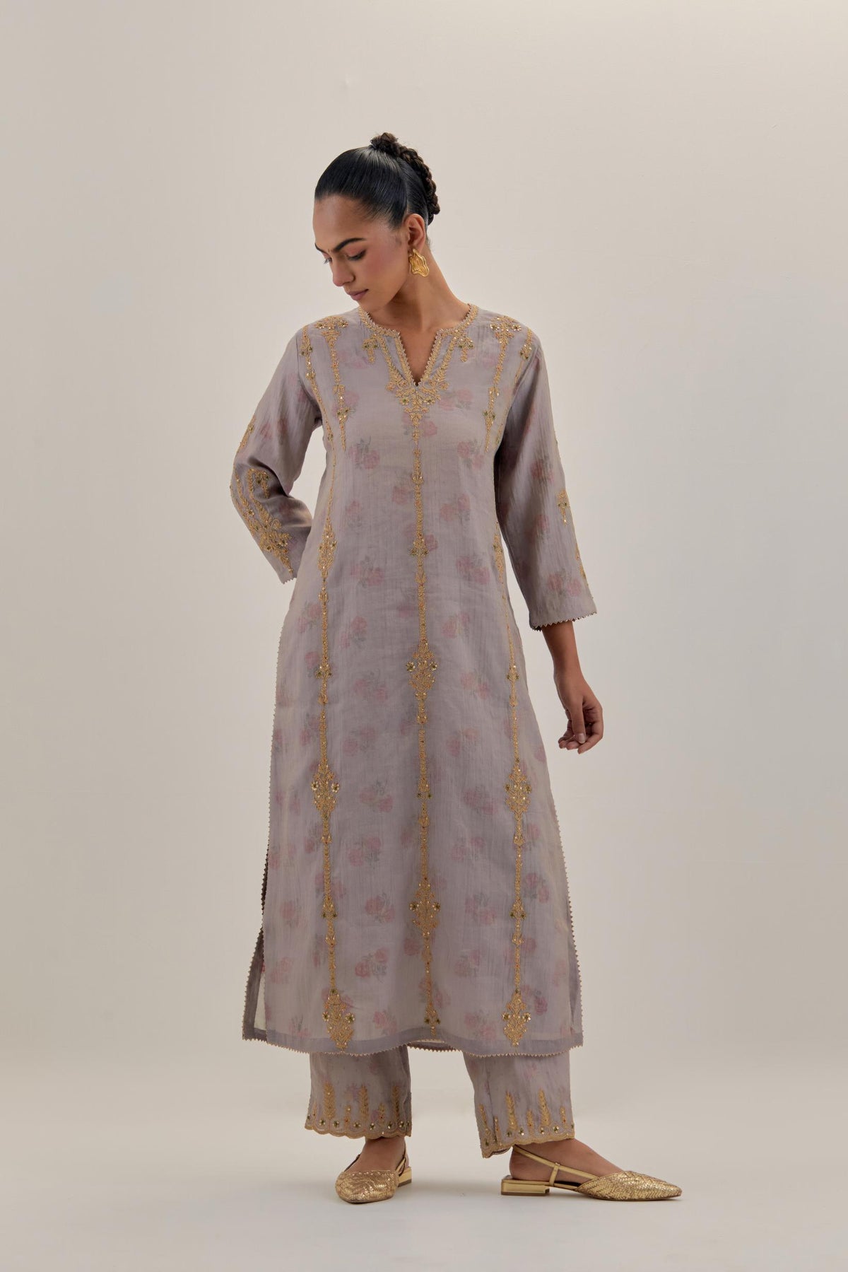Lilac tissue chanderi straight kurta set with light gold dori embroidery, highlighted with multi color bead sequins work.