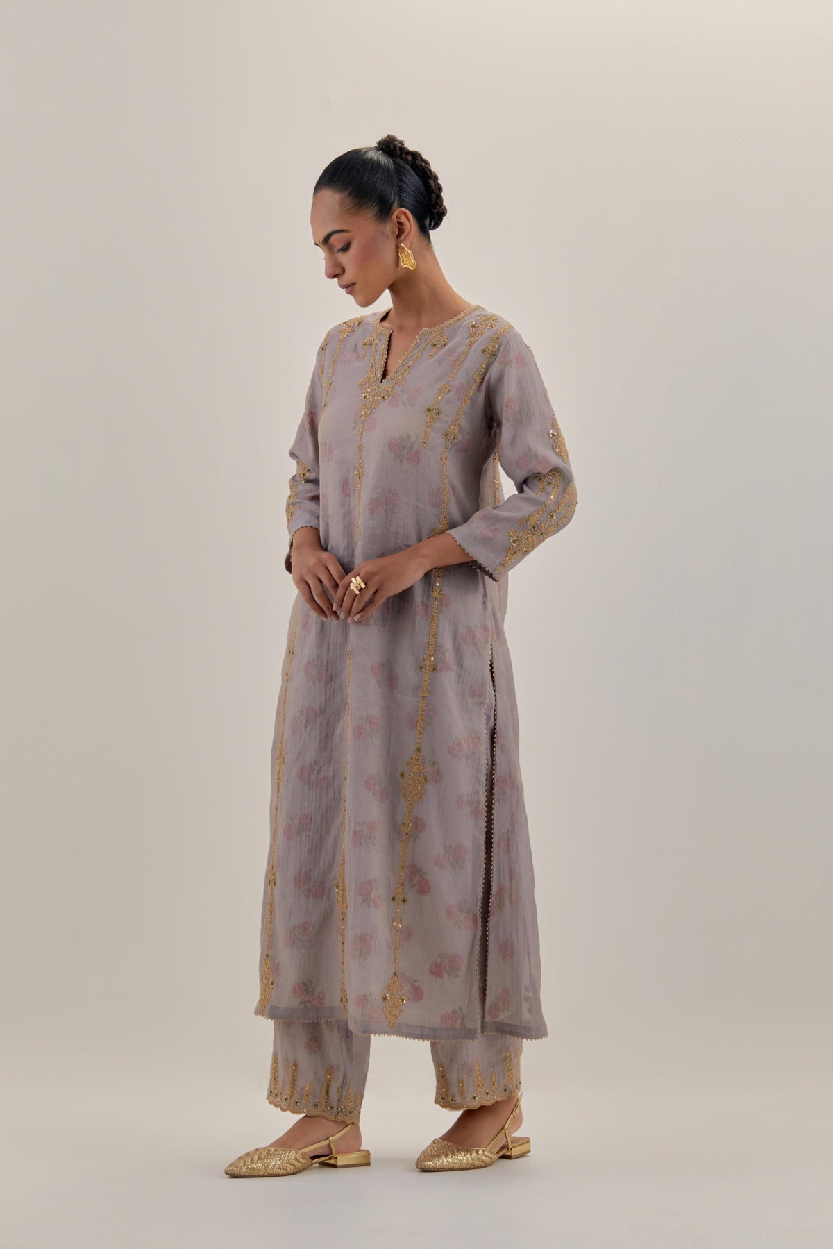 Lilac tissue chanderi straight kurta set with light gold dori embroidery, highlighted with multi color bead sequins work.