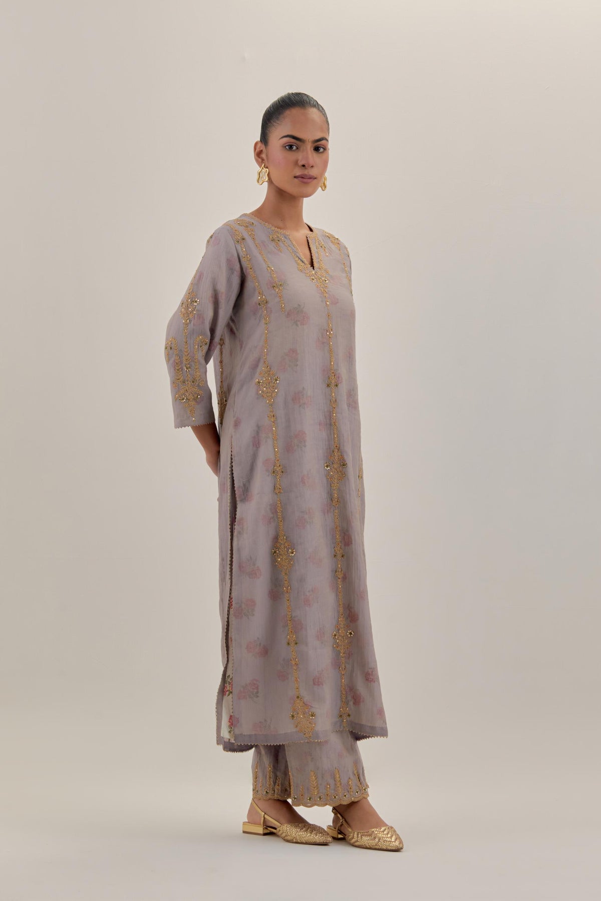 Lilac tissue chanderi straight kurta set with light gold dori embroidery, highlighted with multi color bead sequins work.