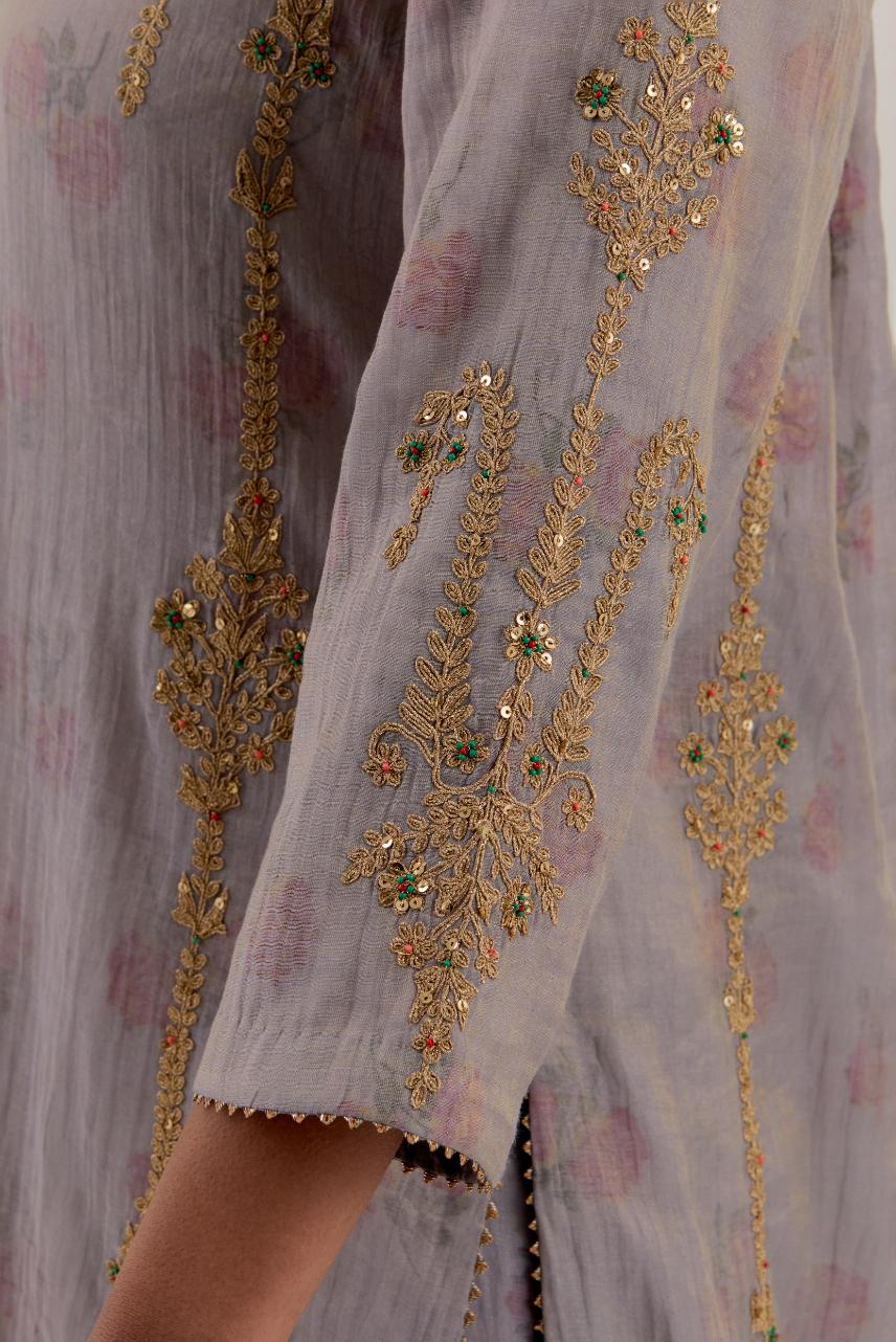 Lilac tissue chanderi straight kurta set with light gold dori embroidery, highlighted with multi color bead sequins work.