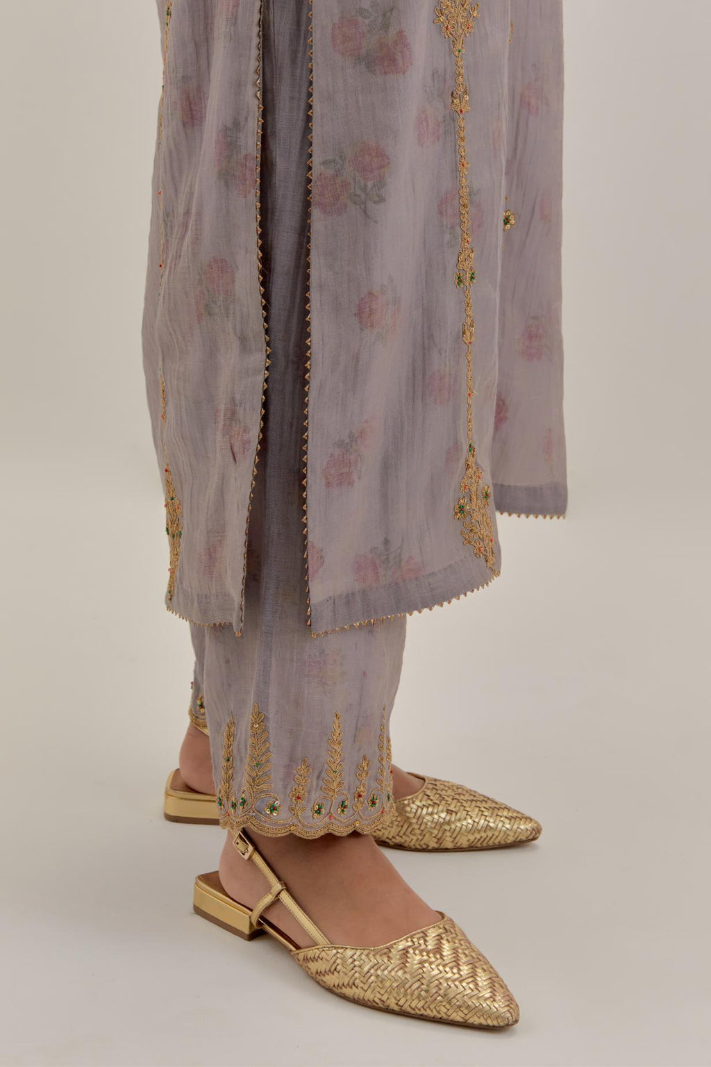 Lilac tissue chanderi straight kurta set with light gold dori embroidery, highlighted with multi color bead sequins work.