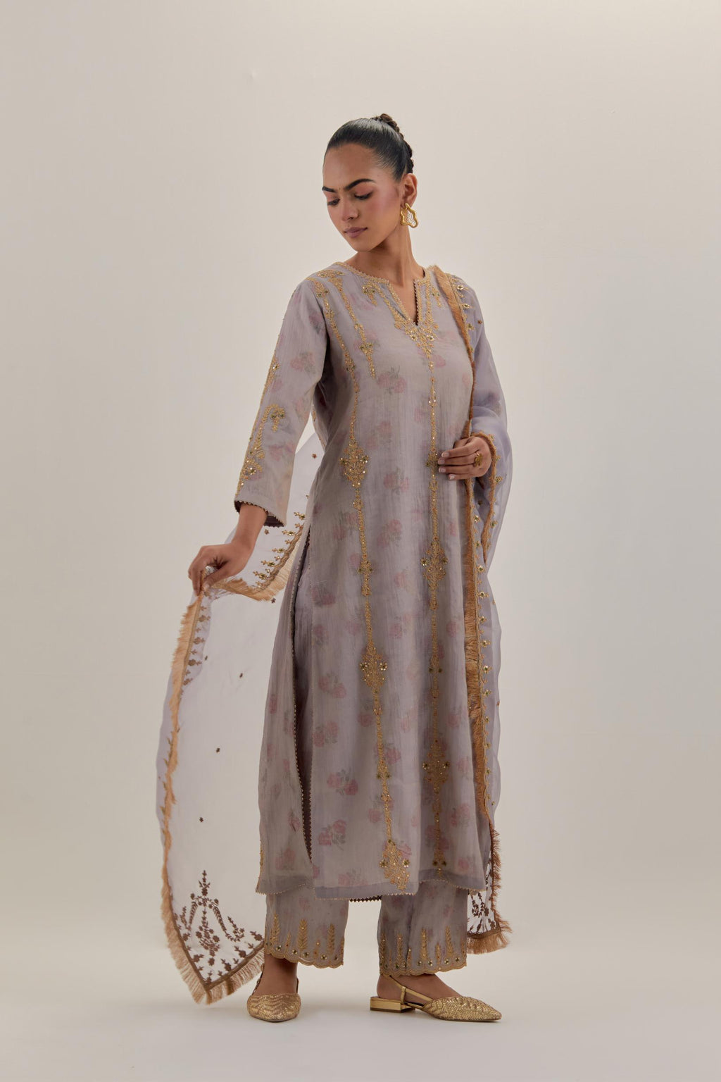 Lilac tissue chanderi straight kurta set with light gold dori embroidery, highlighted with multi color bead sequins work.