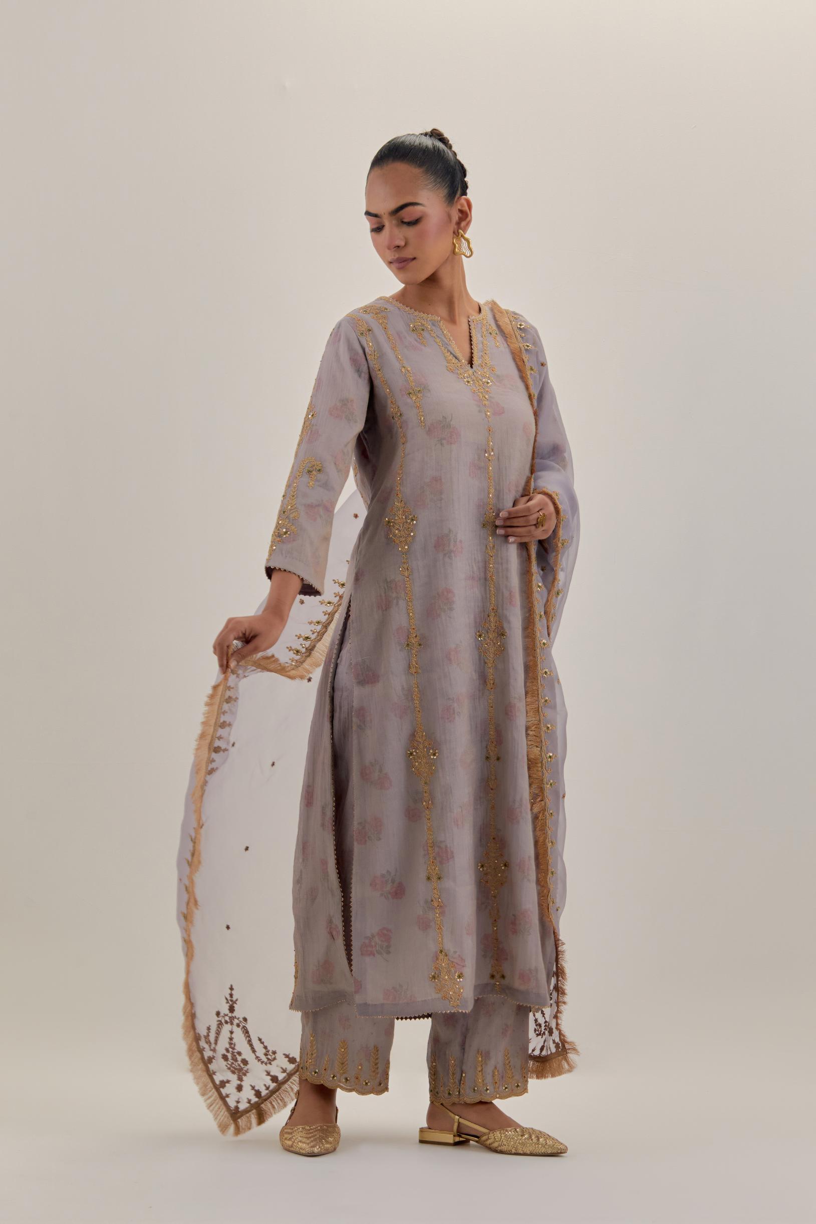 Lilac tissue chanderi straight kurta set with light gold dori embroidery, highlighted with multi color bead sequins work.