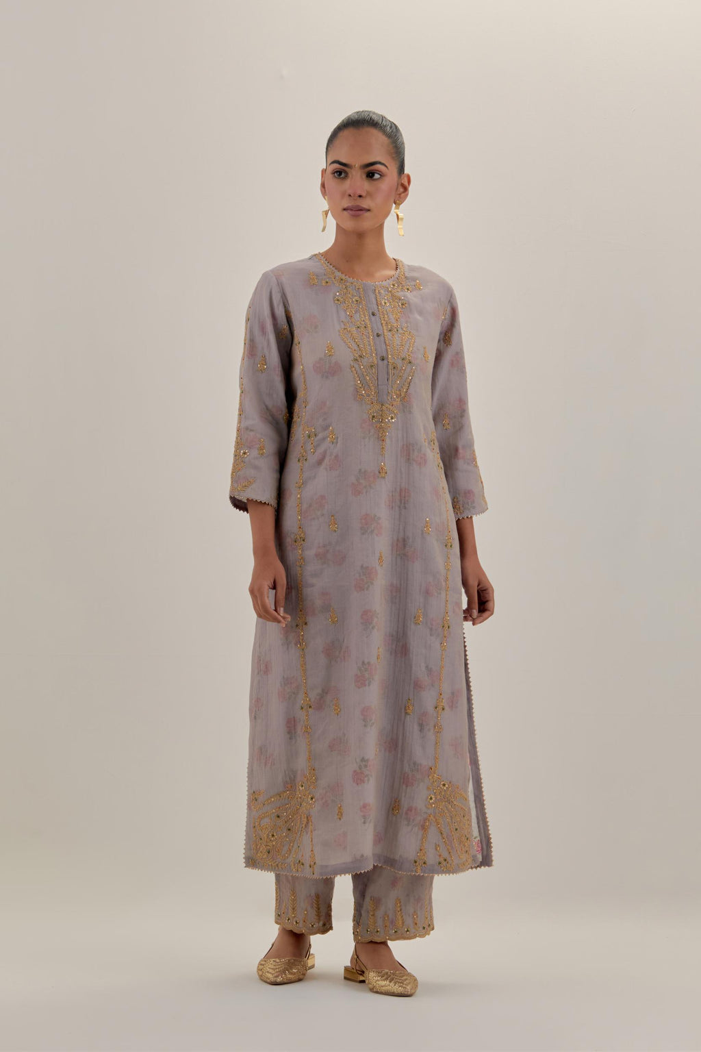 Lilac tissue chanderi straight kurta set with button placket neckline, highlighted with all-over light gold dori embroidery.