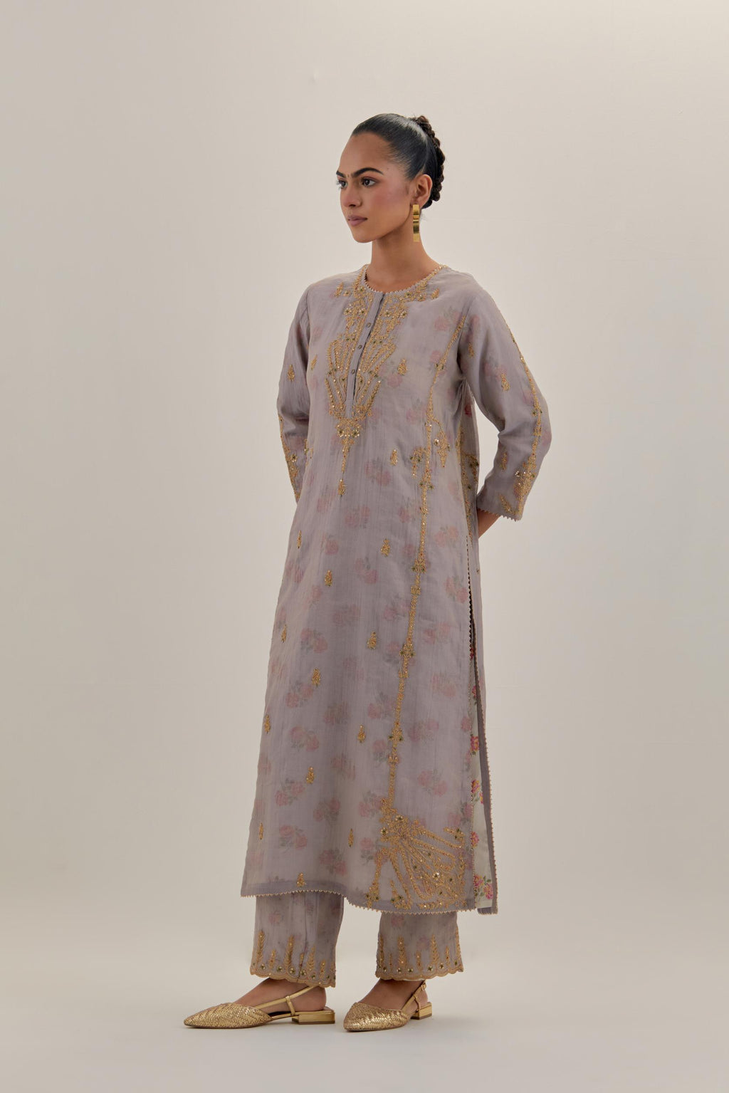 Lilac tissue chanderi straight kurta set with button placket neckline, highlighted with all-over light gold dori embroidery.