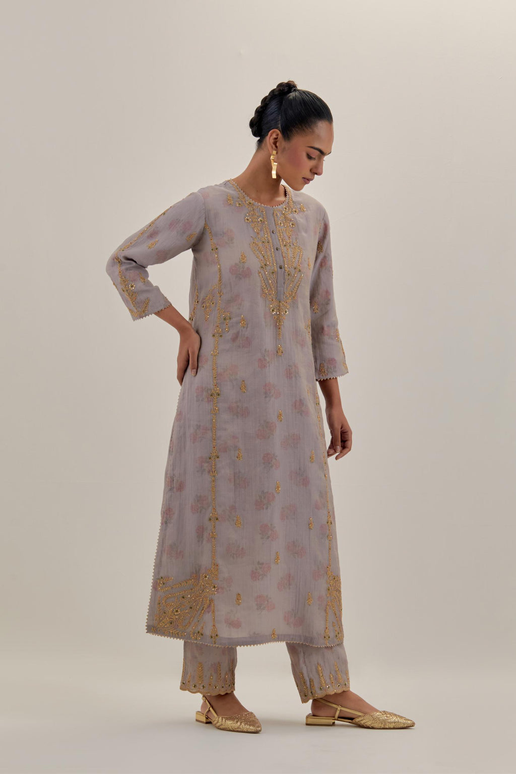 Lilac tissue chanderi straight kurta set with button placket neckline, highlighted with all-over light gold dori embroidery.