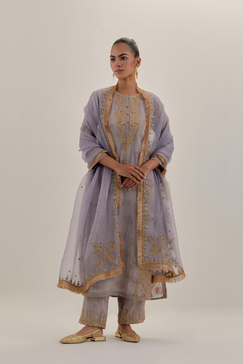 Lilac tissue chanderi straight kurta set with button placket neckline, highlighted with all-over light gold dori embroidery.