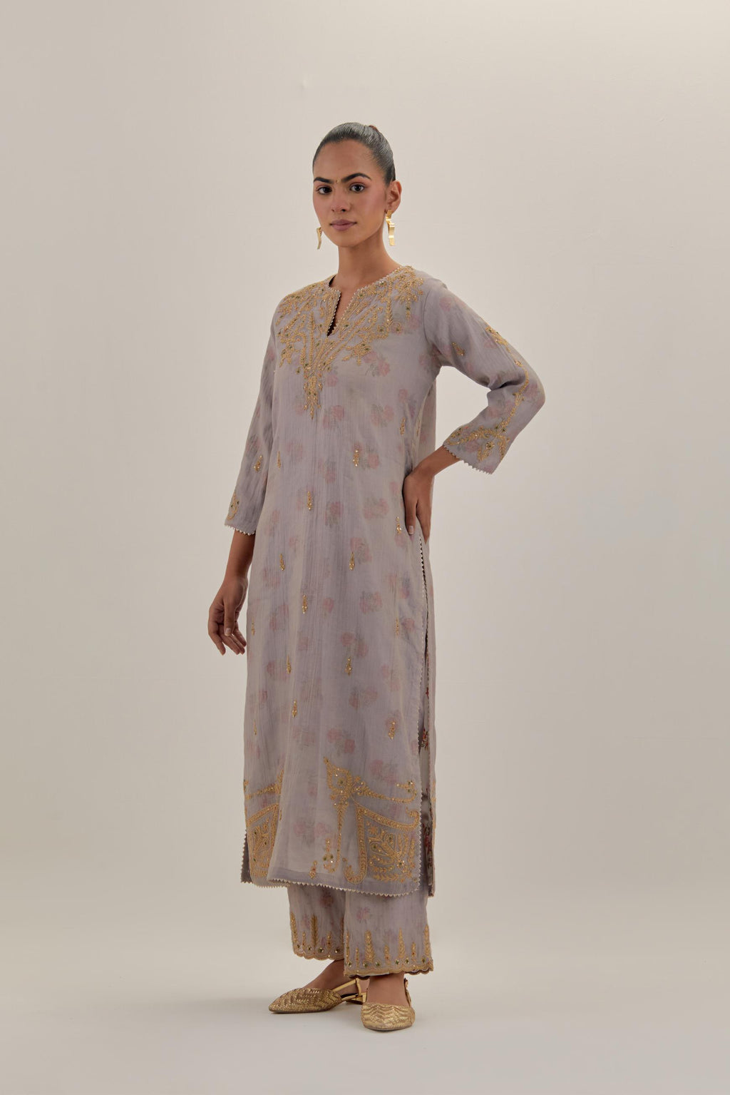 Lilac tissue chanderi straight kurta set, highlighted with light gold dori embroidery and hand block printed lining inside.