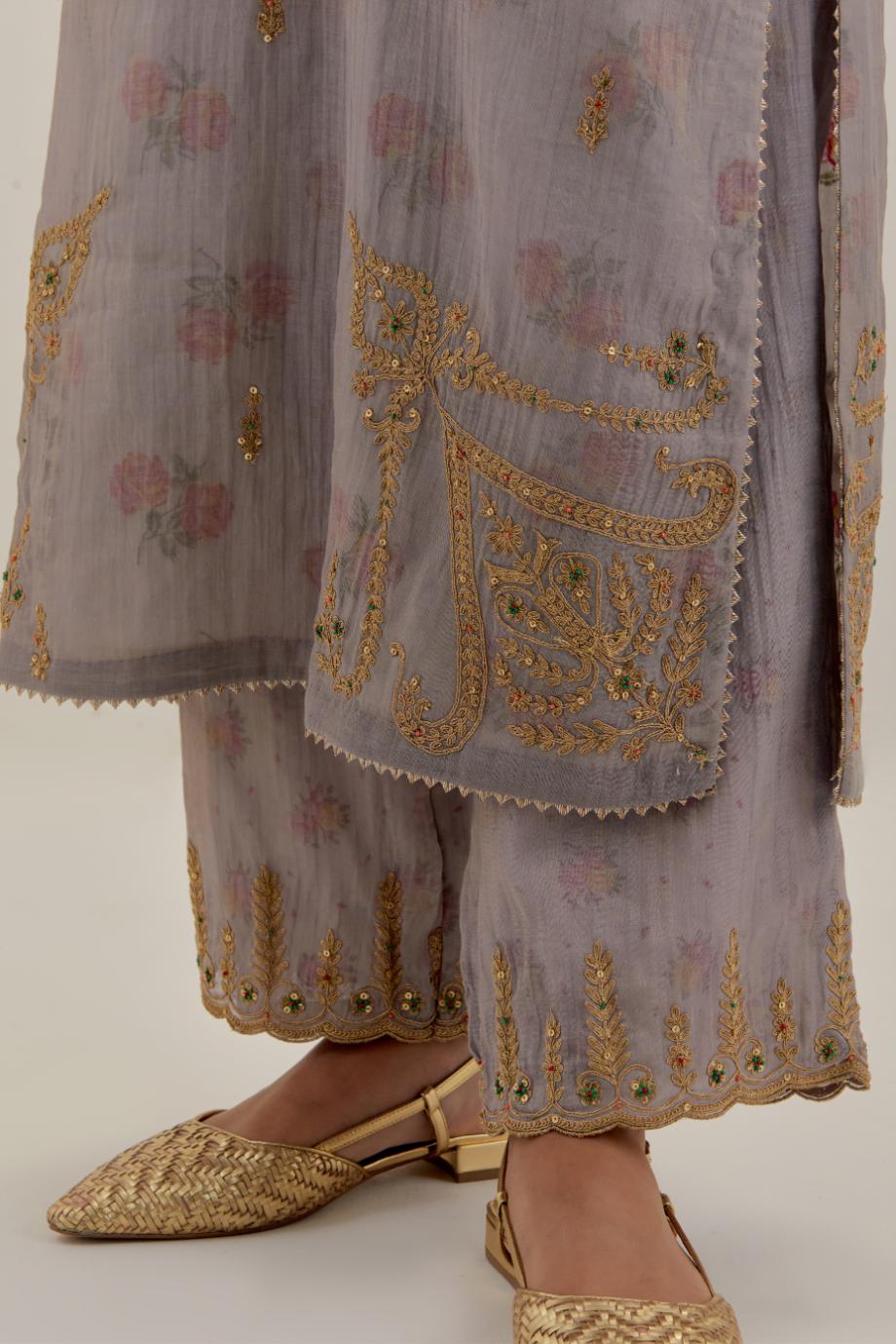 Lilac tissue chanderi straight kurta set, highlighted with light gold dori embroidery and hand block printed lining inside.