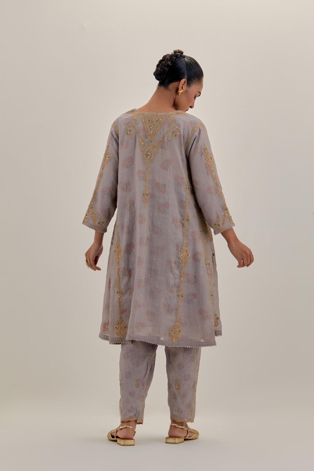 Lilac tissue chanderi easy fit short kalidar kurta set with light gold dori embroidery and hand block printed lining inside.