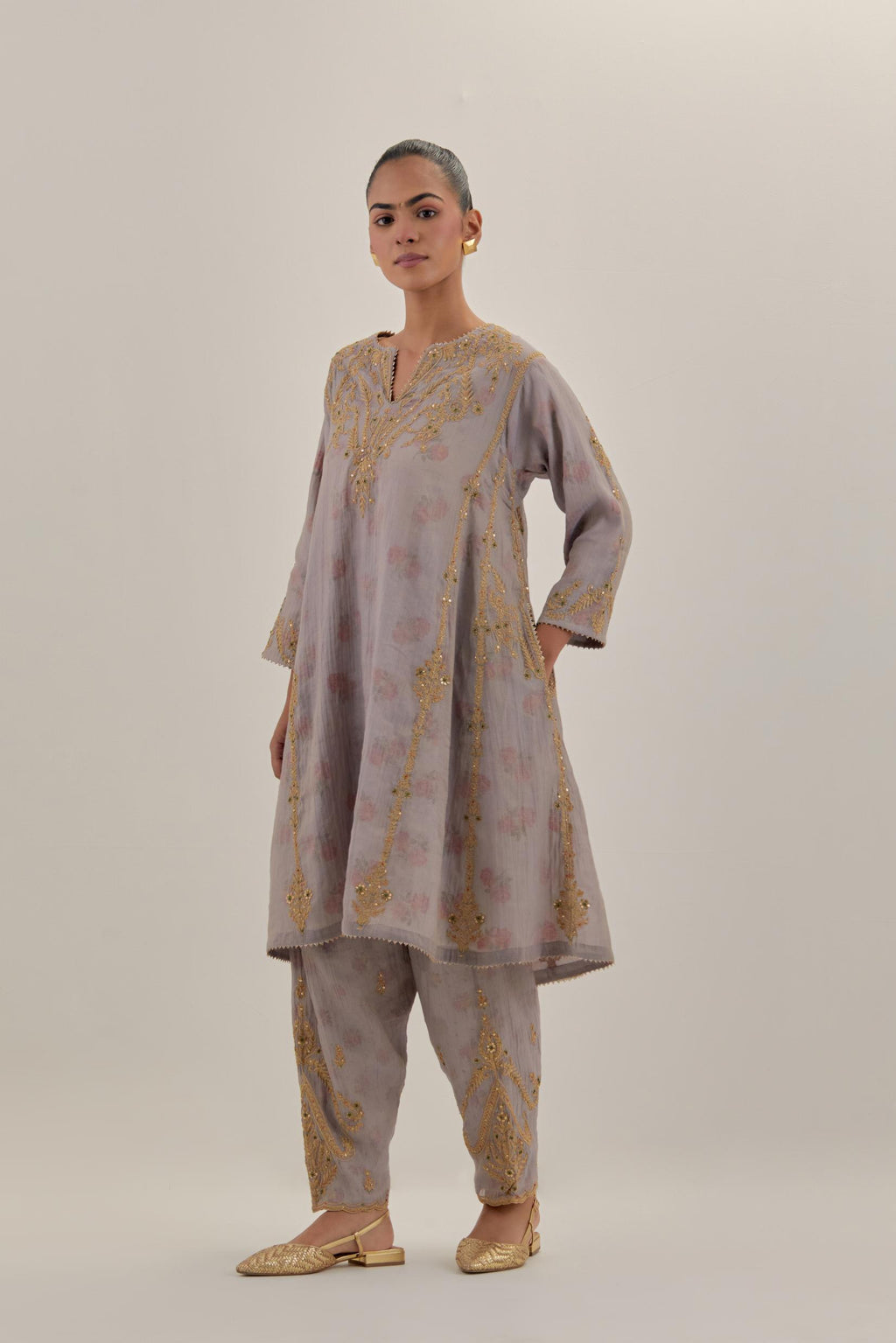 Lilac tissue chanderi easy fit short kalidar kurta set with light gold dori embroidery and hand block printed lining inside.