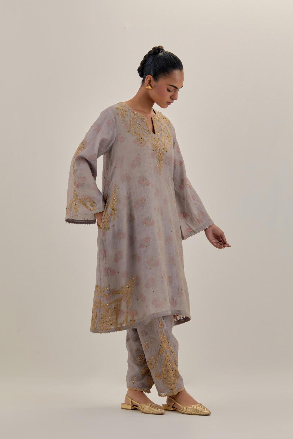 Lilac tissue chanderi A-line kurta set highlighted with light gold dori embroidery and hand block printed lining inside.