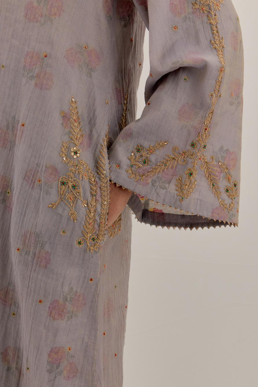 Lilac tissue chanderi A-line kurta set highlighted with light gold dori embroidery and hand block printed lining inside.